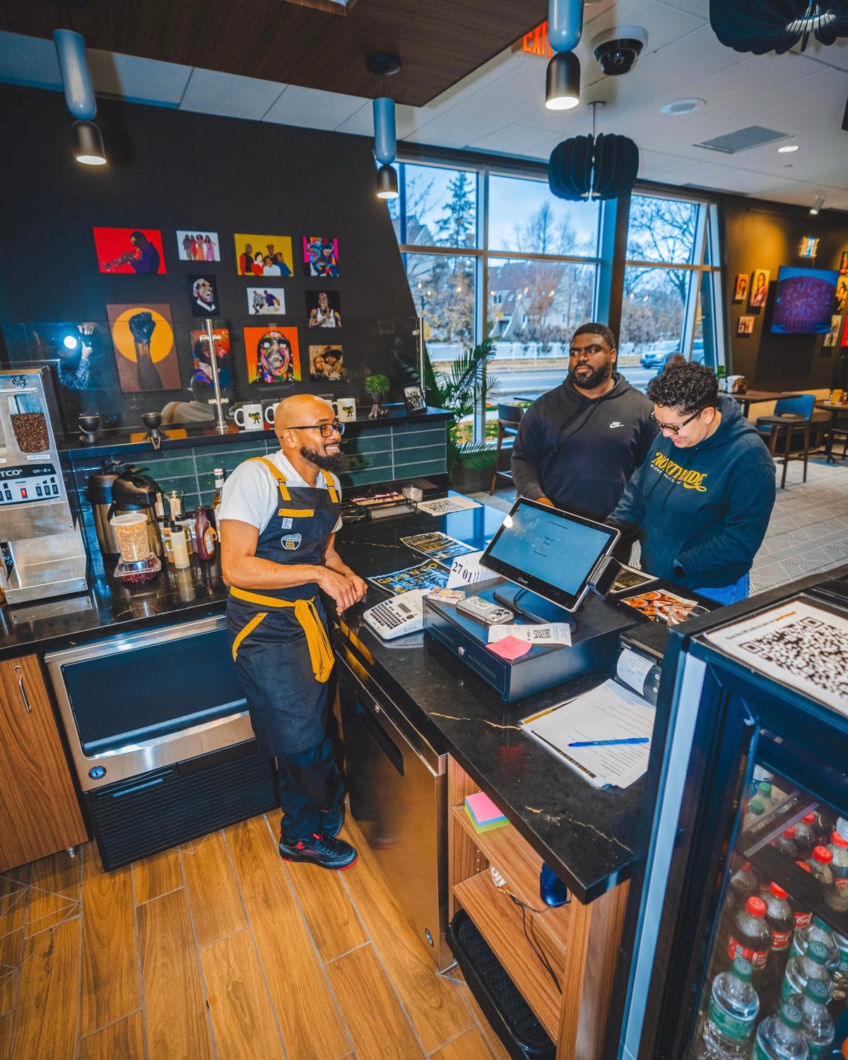 Staff and customers at the Soul Bowl counter