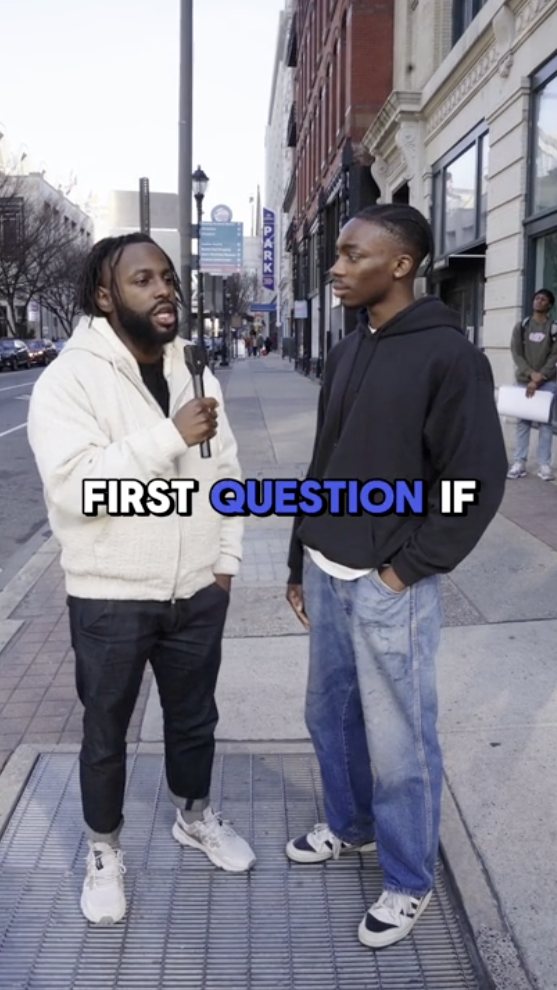 A street interview on a city sidewalk